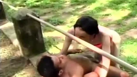 Tattractivety team pokeing A man In The Forest